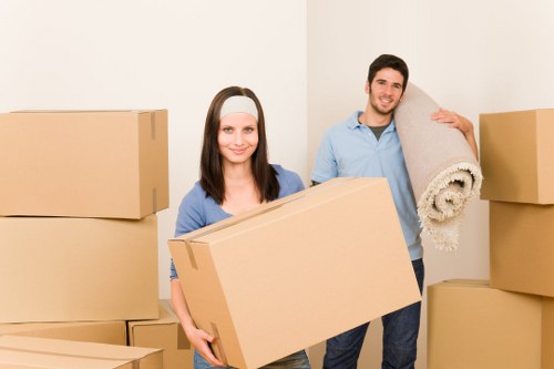 Packed office items and furniture prepared for a local move